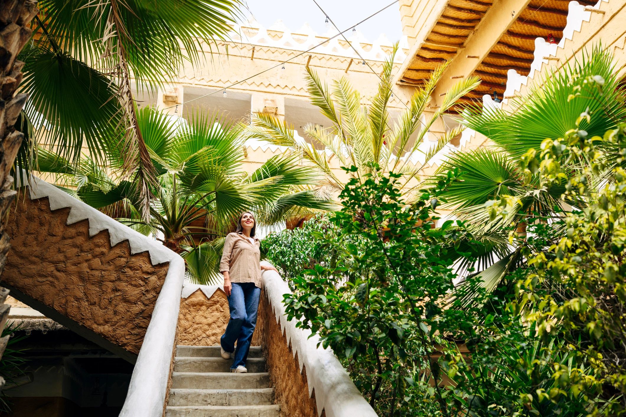Traveler admiring a hidden courtyard destination